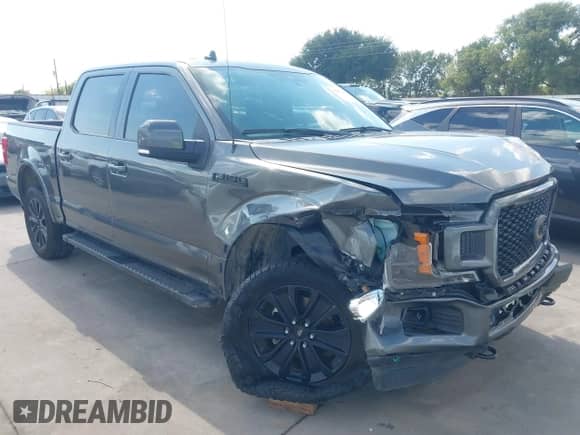2020 Ford F-150 Lariat z VIN 1FTEW1E52LFA13901, wystawiony jako IAAI lot #42933180 z przebiegiem 93 944 mil mil oraz . Historia ofert i sprzedaży dostępna na DreamBid. Obrazek 1.