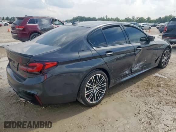 2018 BMW 5 Series 540i с VIN WBAJE5C53JWA93203, выставлен на аукционе Copart как лот 64638075 с пробегом Не указан миль и Списание • Salvage title. История ставок и продаж доступна на DreamBid. Изображение 3.