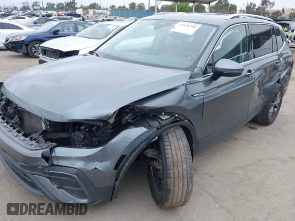 2023 Volkswagen Tiguan SE with VIN 3VV3B7AX0PM130980, listed as a IAAI auction lot 42158302 with 30,653 mi miles and . Bid and sale history available at DreamBid. Image 6.