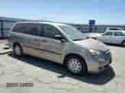 2005 Honda Odyssey LX with VIN 5FNRL38295B101522, listed as a Copart auction lot 65648685 with 148,852 mi miles and Salvage title. Bid and sale history available at DreamBid. Image 4.