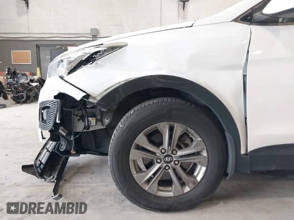 2015 Hyundai Santa Fe with VIN 5XYZUDLB5FG286866, listed as a IAAI auction lot 42641010 with 124,000 mi miles and . Bid and sale history available at DreamBid. Image 6.