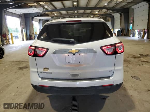 2017 Chevrolet Traverse LT с VIN 1GNKRHKD1HJ107066, выставлен на аукционе Copart как лот 70248925 с пробегом 100 360 миль миль и Списание • Salvage title. История ставок и продаж доступна на DreamBid. Изображение 6.