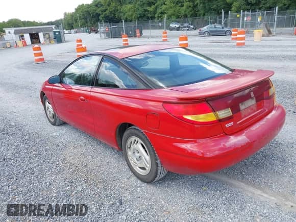 1997 Saturn 2dr Coupe with VIN 1G8ZH127XVZ343833, listed as a IAAI auction lot 42807965 with 253,011 mi miles and . Bid and sale history available at DreamBid. Image 3.