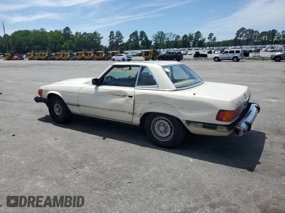 1984 Mercedes-Benz 380 SL with VIN WDBBA45A2EA011340, listed as a Copart auction lot 56949325 with 113,951 mi miles and Salvage title. Bid and sale history available at DreamBid. Image 2.