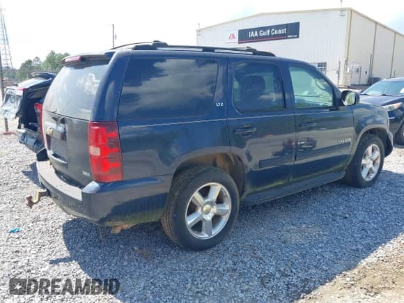 2007 Chevrolet Tahoe LT with VIN 1GNFC13097R232225, listed as a IAAI auction lot 42934650 with 268,502 mi miles and . Bid and sale history available at DreamBid. Image 4.