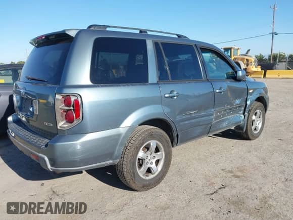 2006 Honda Pilot EX-L with VIN 2HKYF18726H561160, listed as a IAAI auction lot 43045097 with 245,110 mi miles and . Bid and sale history available at DreamBid. Image 4.