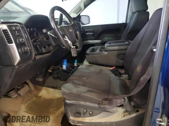 2016 Chevrolet Silverado 1500 LT with VIN 1GCUKREC9GF164552, listed as a Copart auction lot 52196485 with 105,668 mi miles and Salvage title. Bid and sale history available at DreamBid. Image 7.