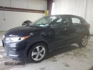 2019 Honda HR-V LX with VIN 3CZRU6H32KG702195, listed as a Copart auction lot 82227745 with 143,051 mi miles and Salvage title. Bid and sale history available at DreamBid. Image 1.