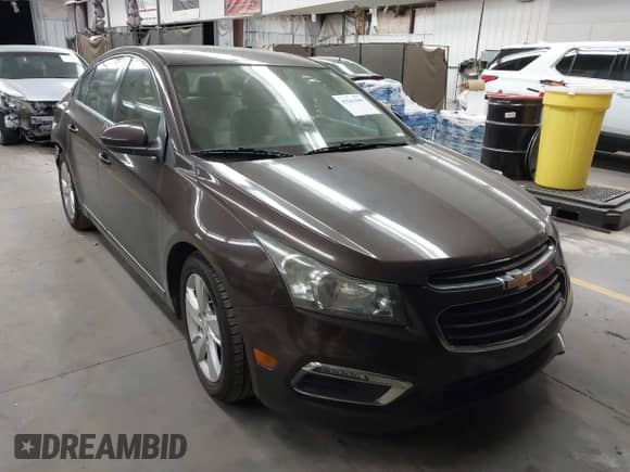 2015 Chevrolet Cruze Diesel z VIN 1G1P75SZ7F7215841, wystawiony jako IAAI lot #43261045 z przebiegiem 135 686 mil mil oraz . Historia ofert i sprzedaży dostępna na DreamBid. Obrazek 1.