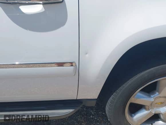 2011 Chevrolet Suburban LTZ with VIN 1GNSKKE37BR348112, listed as a IAAI auction lot 42267962 with 163,558 mi miles and . Bid and sale history available at DreamBid. Image 6.
