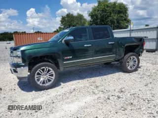 2014 Chevrolet Silverado 1500 LTZ with VIN 3GCUKSEC9EG549659, listed as a Copart auction lot 68818395 with 178,058 mi miles and Salvage title. Bid and sale history available at DreamBid. Image 1.