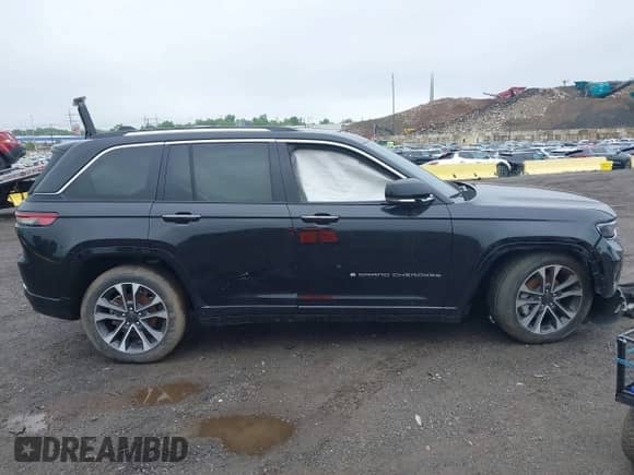 2023 Jeep Grand Cherokee Overland with VIN 1C4RJHDG2PC516797, listed as a IAAI auction lot 42026063 with 25,808 mi miles and . Bid and sale history available at DreamBid. Image 12.