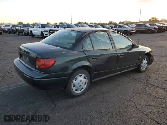 2002 Saturn SL with VIN 1G8ZG52842Z136529, listed as a Copart auction lot 69322825 with 215,279 mi miles and Salvage title. Bid and sale history available at DreamBid. Image 3.