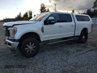 2018 Ford F-250 XL with VIN 1FT7W2B6XJEB66282, listed as a Copart auction lot 89721245 with 126,916 mi miles and Salvage title. Bid and sale history available at DreamBid. Image 1.