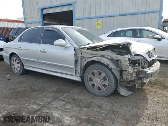 2003 Hyundai Sonata with VIN KMHWF25S63A761771, listed as a Copart auction lot 52436485 with 117,127 mi miles and Clean title. Bid and sale history available at DreamBid. Image 4.