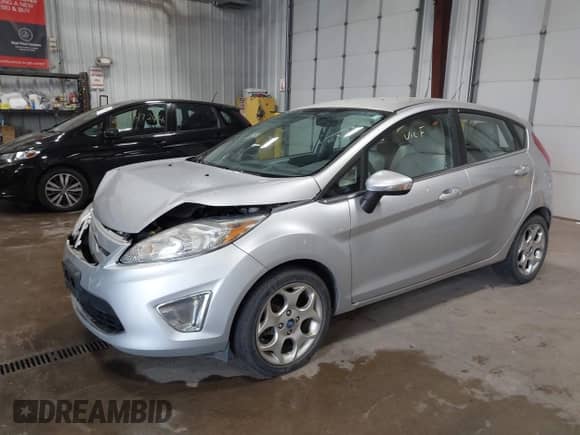 2011 Ford Fiesta SES с VIN 3FADP4FJXBM142897, выставлен на аукционе IAAI как лот 43150222 с пробегом 110 332 миль миль и . История ставок и продаж доступна на DreamBid. Изображение 2.