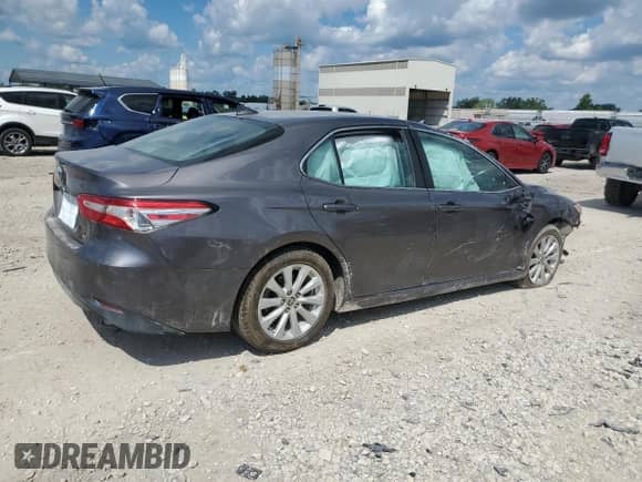2020 Toyota Camry LE с VIN 4T1C11AK1LU399560, выставлен на аукционе Copart как лот 69238445 с пробегом 160 264 миль миль и Списание • Salvage title. История ставок и продаж доступна на DreamBid. Изображение 3.