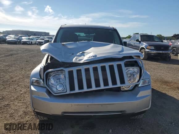 2011 Jeep Liberty Sport with VIN 1J4PN2GK1BW520494, listed as a Copart auction lot 69432985 with 97,037 mi miles and Salvage title. Bid and sale history available at DreamBid. Image 5.