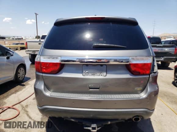 2011 Dodge Durango Crew with VIN 1D4RD4GG9BC740334, listed as a Copart auction lot 59697313 with 163,267 mi miles and Salvage title. Bid and sale history available at DreamBid. Image 6.