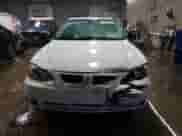 2002 Pontiac Grand Am SE1 z VIN 1G2NF52E92C309398, wystawiony jako Copart lot #87854945 z przebiegiem 57 468 mil mil oraz Szkoda całkowita • Salvage title. Historia ofert i sprzedaży dostępna na DreamBid. Obrazek 5.