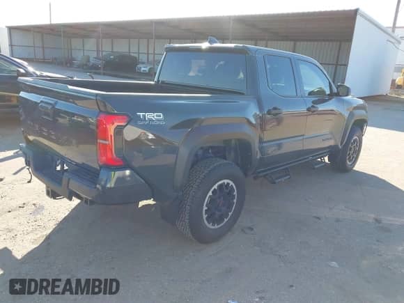 2024 Toyota Tacoma SR5 with VIN 3TYLB5JN0RT029530, listed as a IAAI auction lot 41213742 with 5,370 mi miles and . Bid and sale history available at DreamBid. Image 4.