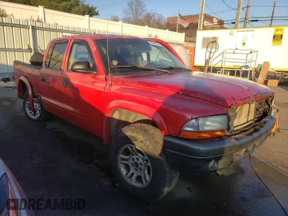 2002 Dodge Dakota Sport с VIN 1B7HG38NX2S515384, выставлен на аукционе Copart как лот 80640954 с пробегом 247 495 миль миль и Списание • Salvage title. История ставок и продаж доступна на DreamBid. Изображение 4.