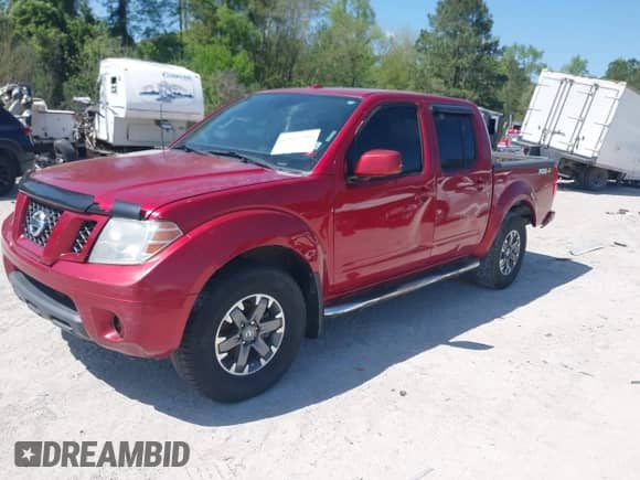 2014 Nissan Frontier S with VIN 1N6AD0EV3EN734085, listed as a IAAI auction lot 42007200 with Not provided miles and . Bid and sale history available at DreamBid. Image 2.