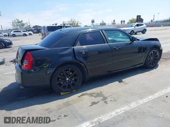 2006 Chrysler 300 C SRT-8 with VIN 2C3LA73W86H518966, listed as a IAAI auction lot 42725107 with 175,474 mi miles and . Bid and sale history available at DreamBid. Image 4.