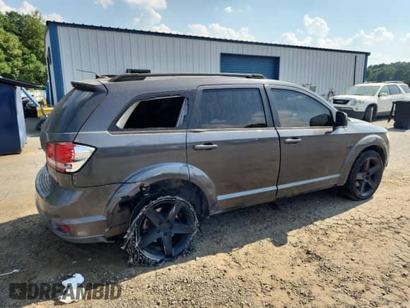 2015 Dodge Journey SXT with VIN 3C4PDCBB4FT655017, listed as a Copart auction lot 81322195 with 122,679 mi miles and Salvage title. Bid and sale history available at DreamBid. Image 3.