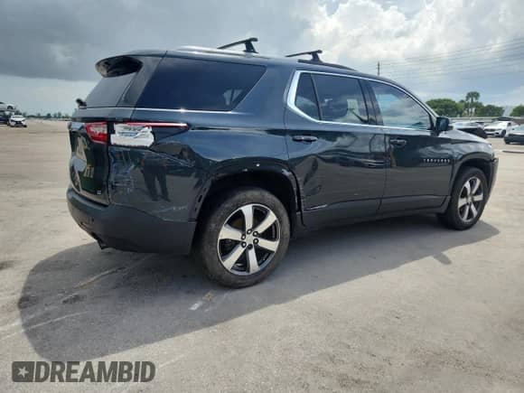 2018 Chevrolet Traverse LT с VIN 1GNERHKWXJJ169067, выставлен на аукционе Copart как лот 69813785 с пробегом 174 248 миль миль и Списание • Salvage title. История ставок и продаж доступна на DreamBid. Изображение 3.