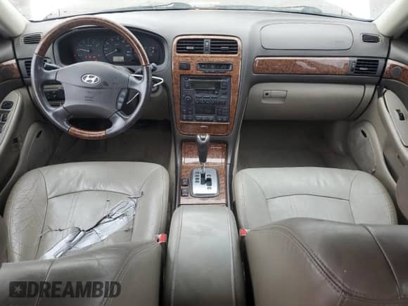 2004 Hyundai XG с VIN KMHFU45EX4A284131, выставлен на аукционе Copart как лот 69398205 с пробегом 123 482 миль миль и Списание • Salvage title. История ставок и продаж доступна на DreamBid. Изображение 8.