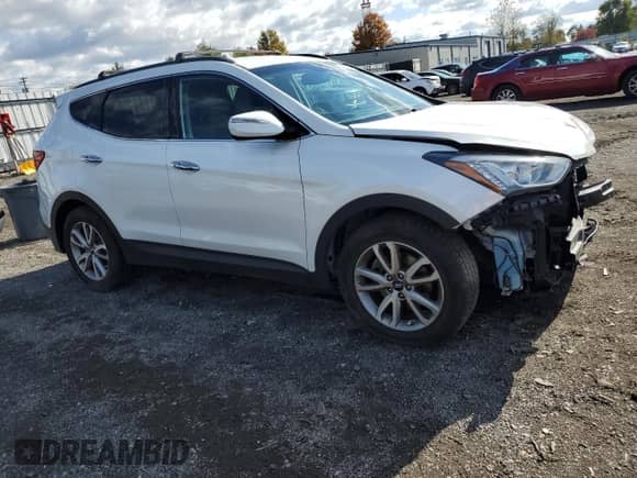 2015 Hyundai Santa Fe с VIN 5XYZUDLA4FG261139, выставлен на аукционе Copart как лот 86995445 с пробегом 90 078 миль миль и Списание • Salvage title. История ставок и продаж доступна на DreamBid. Изображение 4.