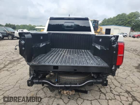 2024 Toyota Tacoma SR5 with VIN 3TYLB5JN2RT035281, listed as a Copart auction lot 69350095 with 9,907 mi miles and Salvage title. Bid and sale history available at DreamBid. Image 6.