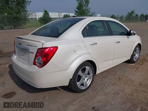 2013 Chevrolet Sonic LTZ with VIN 1G1JE5SB5D4195389, listed as a IAAI auction lot 42400418 with 27,607 mi miles and . Bid and sale history available at DreamBid. Image 4.