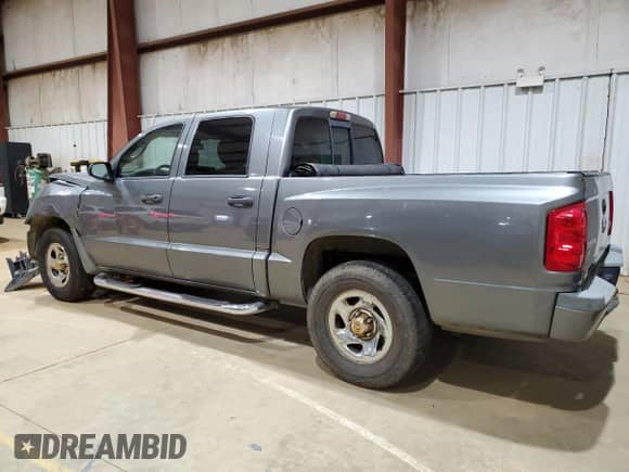 2007 Dodge Dakota SLT z VIN 1D7HE48P67S198715, wystawiony jako Copart lot #46497595 z przebiegiem 171 572 mil mil oraz Szkoda całkowita • Salvage title. Historia ofert i sprzedaży dostępna na DreamBid. Obrazek 2.