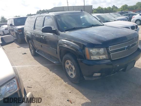 2011 Chevrolet Suburban LT with VIN 1GNSCJE07BR259203, listed as a IAAI auction lot 42888910 with 246,717 mi miles and . Bid and sale history available at DreamBid. Image 1.
