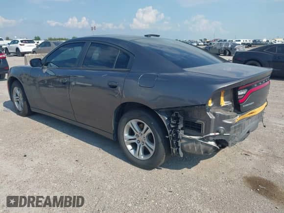 2015 Dodge Charger SE with VIN 2C3CDXBGXFH735601, listed as a IAAI auction lot 43106037 with 116,702 mi miles and . Bid and sale history available at DreamBid. Image 3.