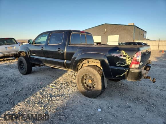 2009 Toyota Tacoma with VIN 3TMMU52N79M010028, listed as a Copart auction lot 90730685 with 223,429 mi miles and Clean title. Bid and sale history available at DreamBid. Image 2.