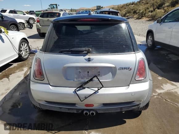 2006 MINI Hardtop S with VIN WMWRE33586TJ37385, listed as a Copart auction lot 67606184 with 78,671 mi miles and Salvage title. Bid and sale history available at DreamBid. Image 6.