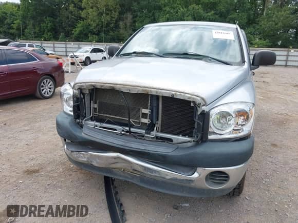 2007 Dodge 1500 ST z VIN 1D7HU16P27J636639, wystawiony jako IAAI lot #42918461 z przebiegiem 167 720 mil mil oraz . Historia ofert i sprzedaży dostępna na DreamBid. Obrazek 6.