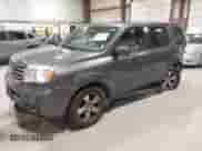 2013 Honda Pilot EX-L with VIN 5FNYF4H55DB033673, listed as a IAAI auction lot 43454478 with 215,014 mi miles and . Bid and sale history available at DreamBid. Image 2.