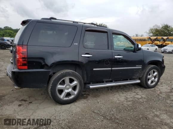 2011 Chevrolet Tahoe LTZ with VIN 1GNSKCE05BR254175, listed as a Copart auction lot 80693645 with 265,816 mi miles and Salvage title. Bid and sale history available at DreamBid. Image 3.