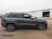 2017 Jeep Grand Cherokee Overland with VIN 1C4RJFCG6HC964435, listed as a IAAI auction lot 42407567 with 113,760 mi miles and . Bid and sale history available at DreamBid. Image 14.