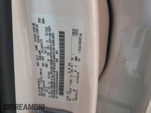 2017 Ford Escape Titanium with VIN 1FMCU0J91HUD92047, listed as a Copart auction lot 59494725 with 114,968 mi miles and Salvage title. Bid and sale history available at DreamBid. Image 13.