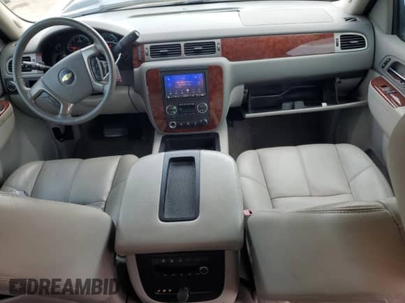 2012 Chevrolet Tahoe LT with VIN 1GNSCBE08CR103498, listed as a Copart auction lot 70521275 with 104,735 mi miles and Salvage title. Bid and sale history available at DreamBid. Image 8.