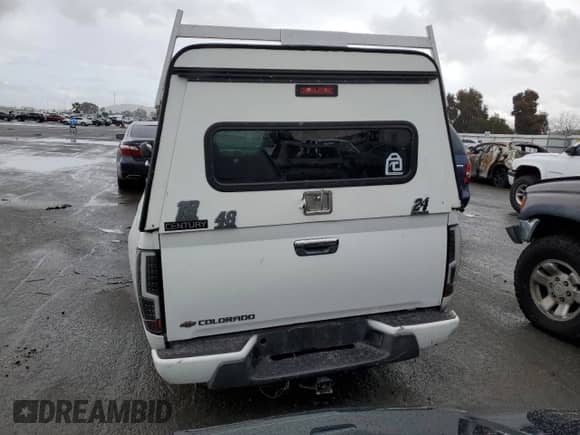 2009 Chevrolet Colorado Work Truck with VIN 1GCCS149398145750, listed as a Copart auction lot 45337275 with 173,505 mi miles and Salvage title. Bid and sale history available at DreamBid. Image 6.