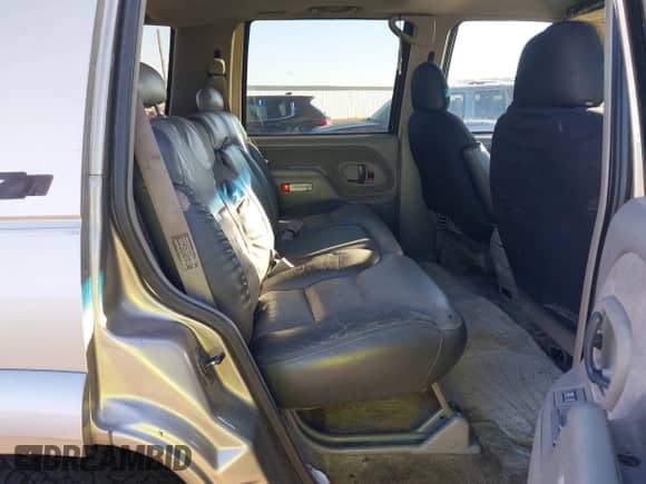 2000 Chevrolet Tahoe Z71 with VIN 1GNEK13R3YR119515, listed as a IAAI auction lot 43463162 with 303,648 mi miles and . Bid and sale history available at DreamBid. Image 8.