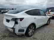 2023 Tesla Model Y Long Range с VIN 7SAYGAEE9PF584339, выставлен на аукционе Copart как лот 56988655 с пробегом Не указан миль и Списание • Salvage title. История ставок и продаж доступна на DreamBid. Изображение 3.