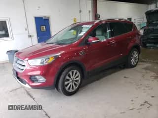 2017 Ford Escape Titanium with VIN 1FMCU9J92HUB62618, listed as a Copart auction lot 61932215 with 122,189 mi miles and Salvage title. Bid and sale history available at DreamBid. Image 1.