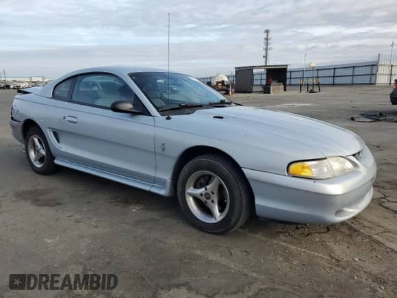 1996 Ford Mustang z VIN 1FALP4047TF106715, wystawiony jako Copart lot #78658044 z przebiegiem 60 205 mil mil oraz Szkoda całkowita • Salvage title. Historia ofert i sprzedaży dostępna na DreamBid. Obrazek 4.